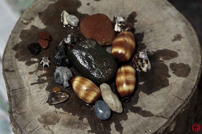 A blood offering on otane stones and shells