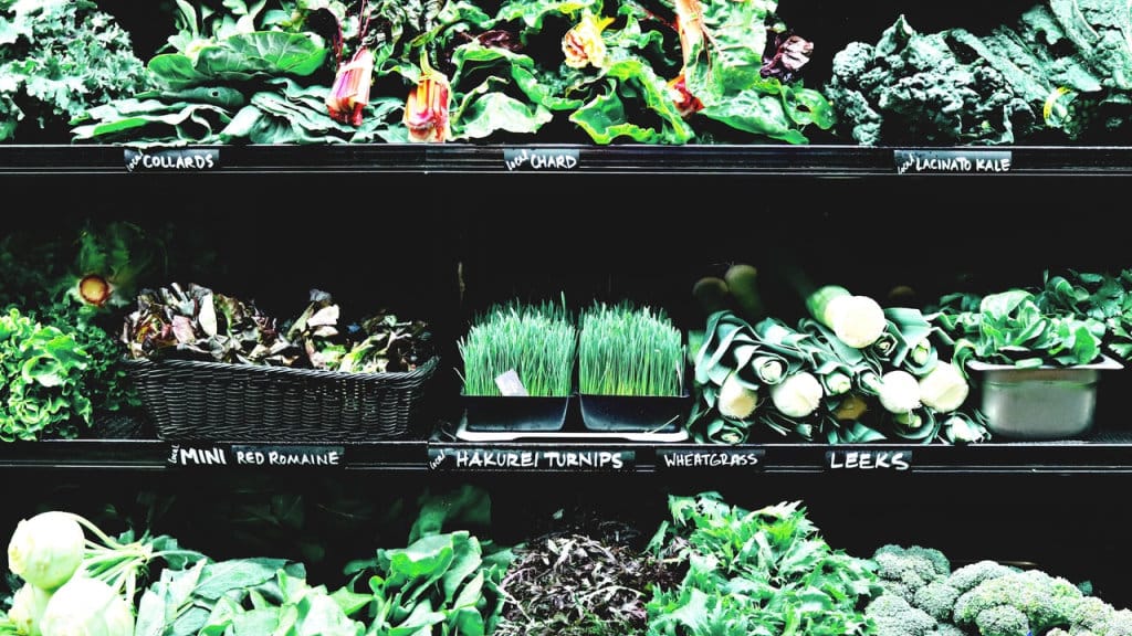 An assortment of cool season vegetables in the produce aisle