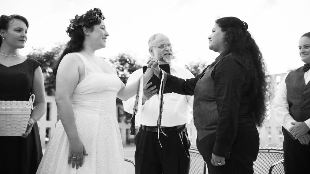 A handfasting ceremony between two women