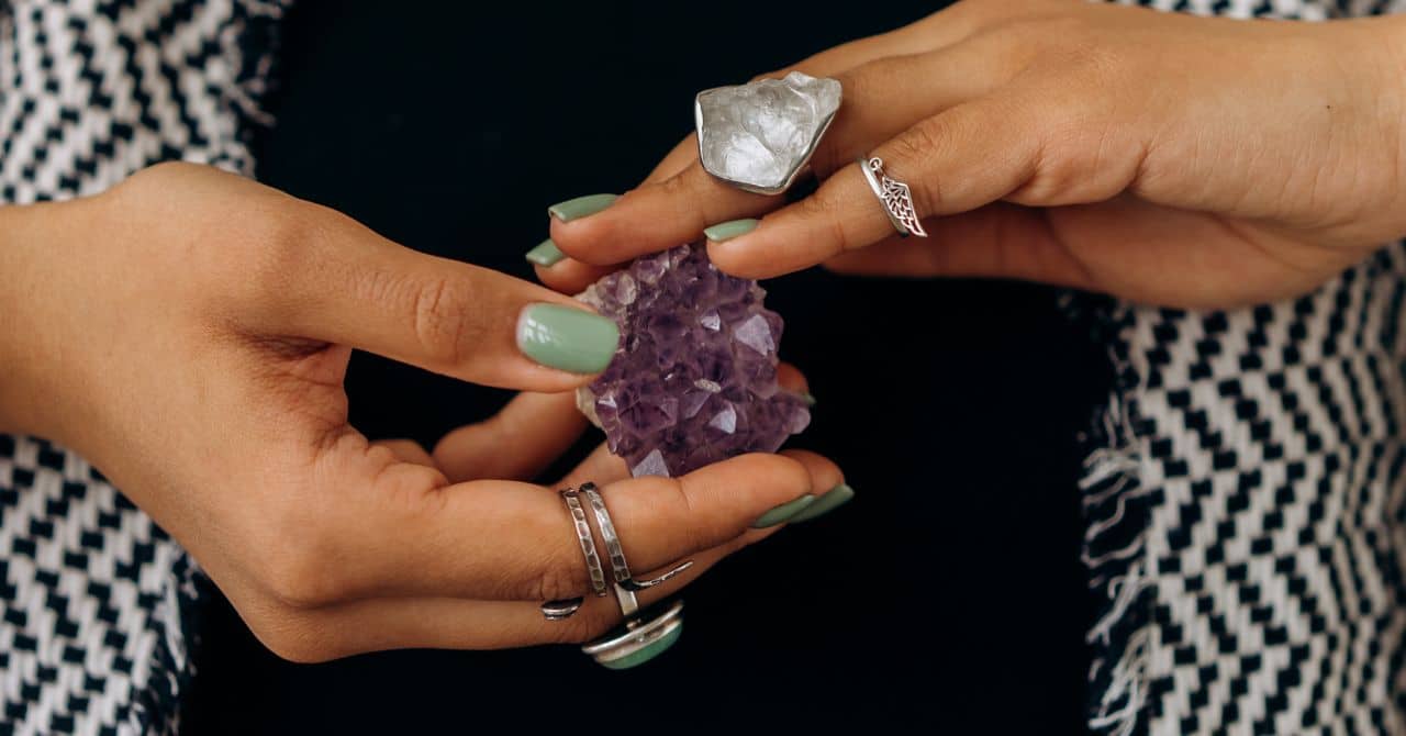 A Person Holding Amethyst Crystals