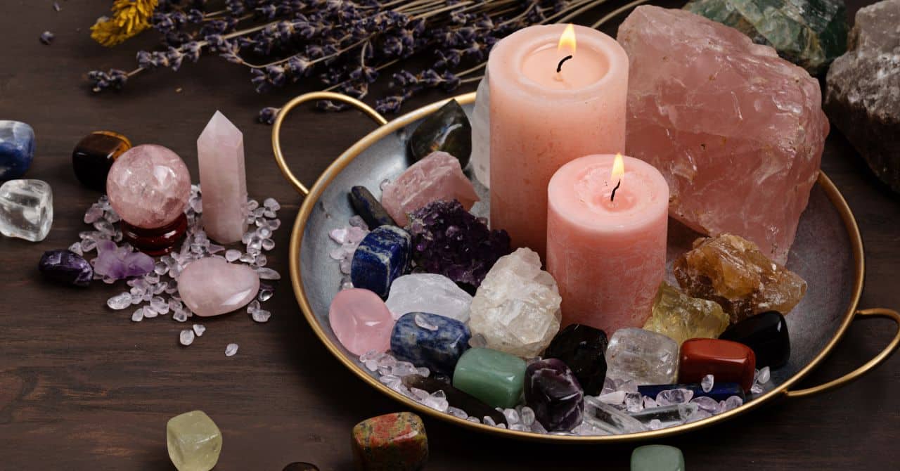Crystals with Lighted Candles on the Metal Tray