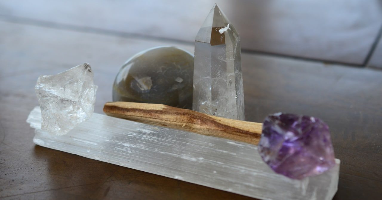 Crystals Charging on a Selenite Wand