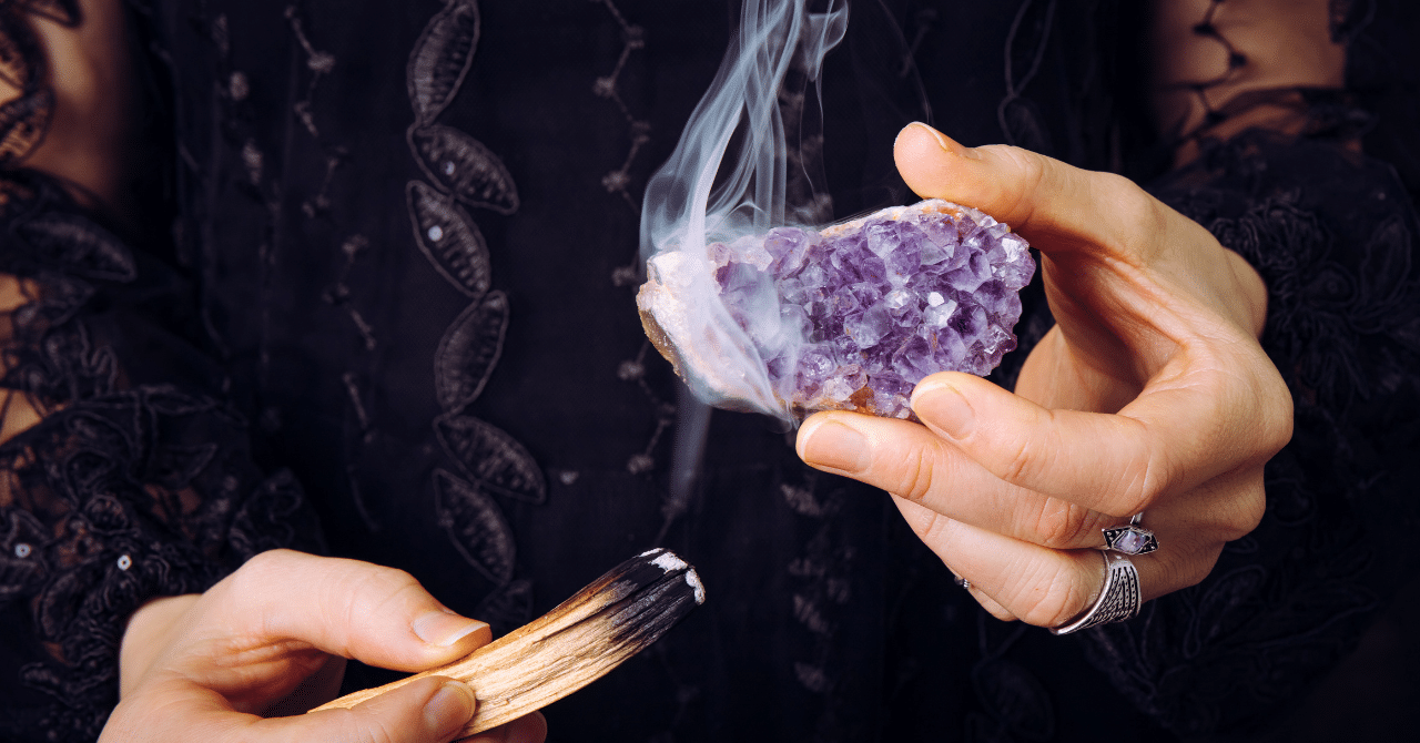 A Person Burning Incense for Cleansing Crystal