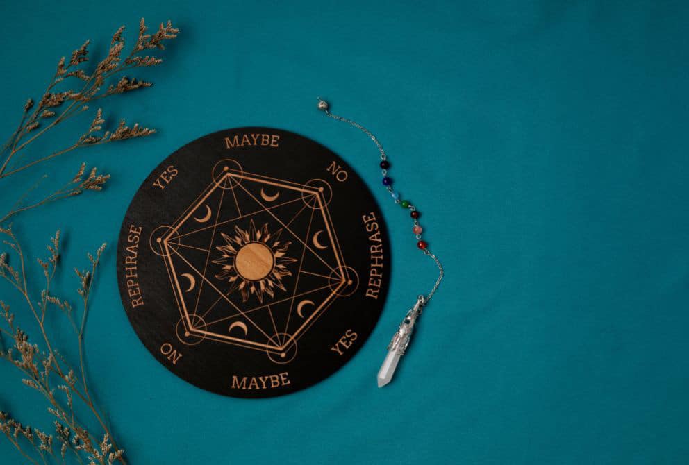Pendulum Mat with Pendulum on the Table