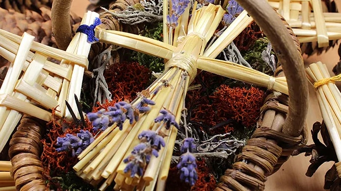 A beautiful Brigid doll made from straw in a basket