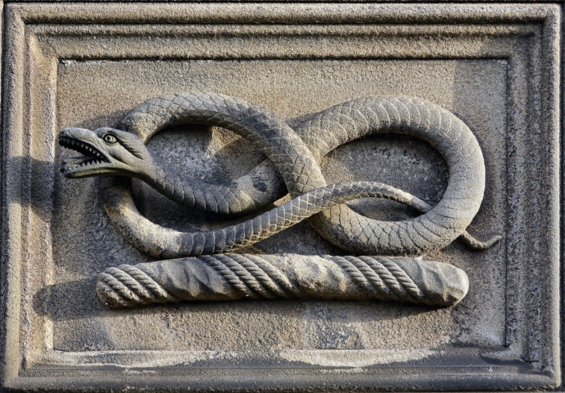 A stone carving of a serpent