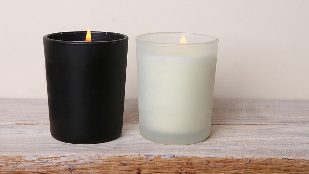 A black candle and a white candle