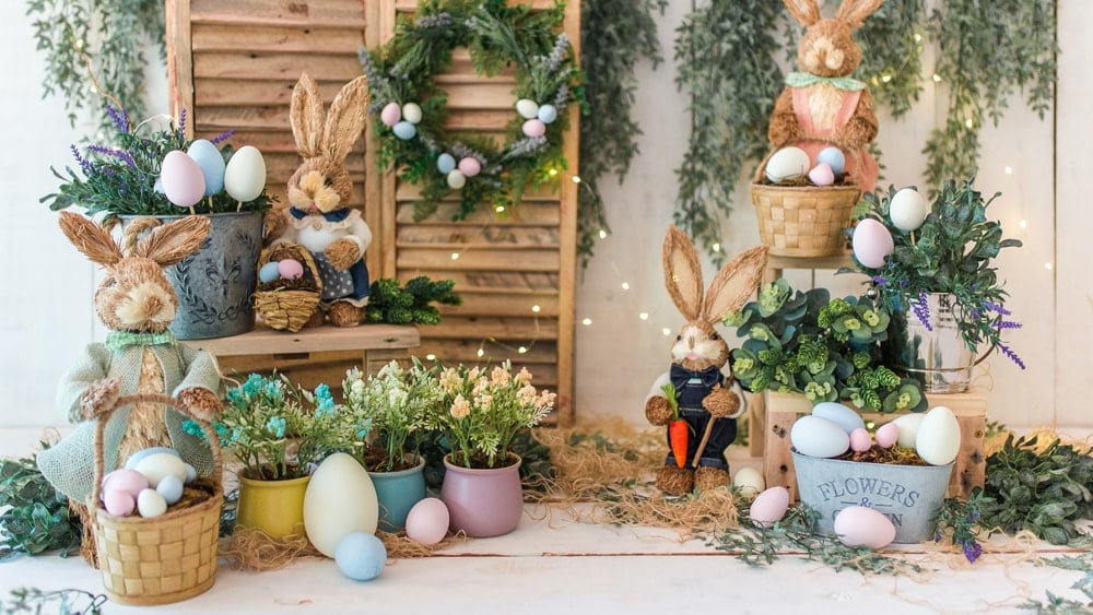 Springtime display with rabbits, eggs, and fresh plants