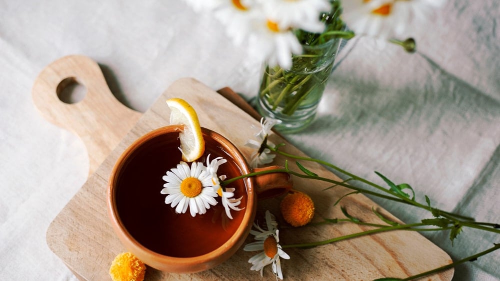 Chamomile tea made with lemon and chamomile flowers