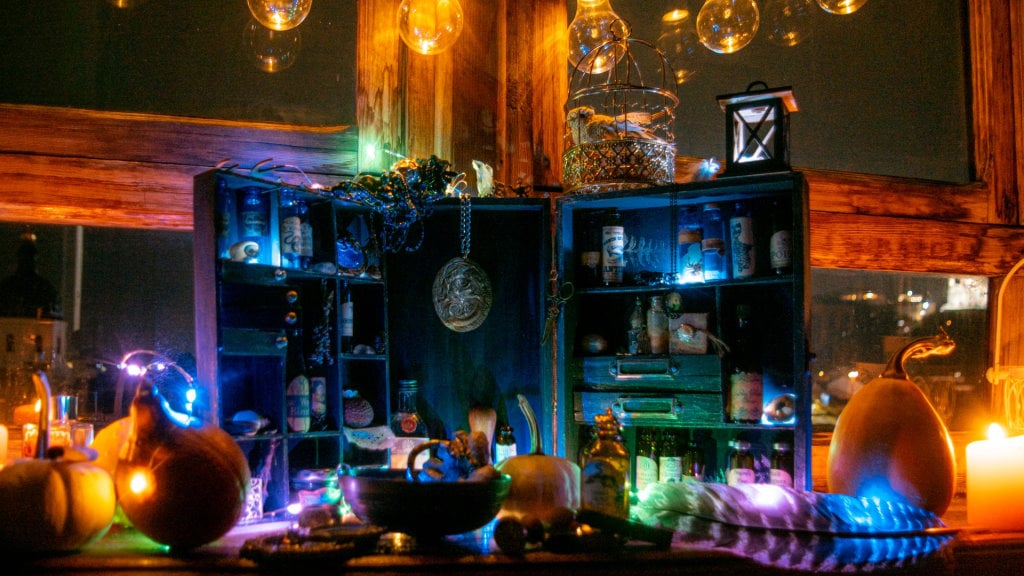 a Samhain altar featuring a wide assortment of Halloween items