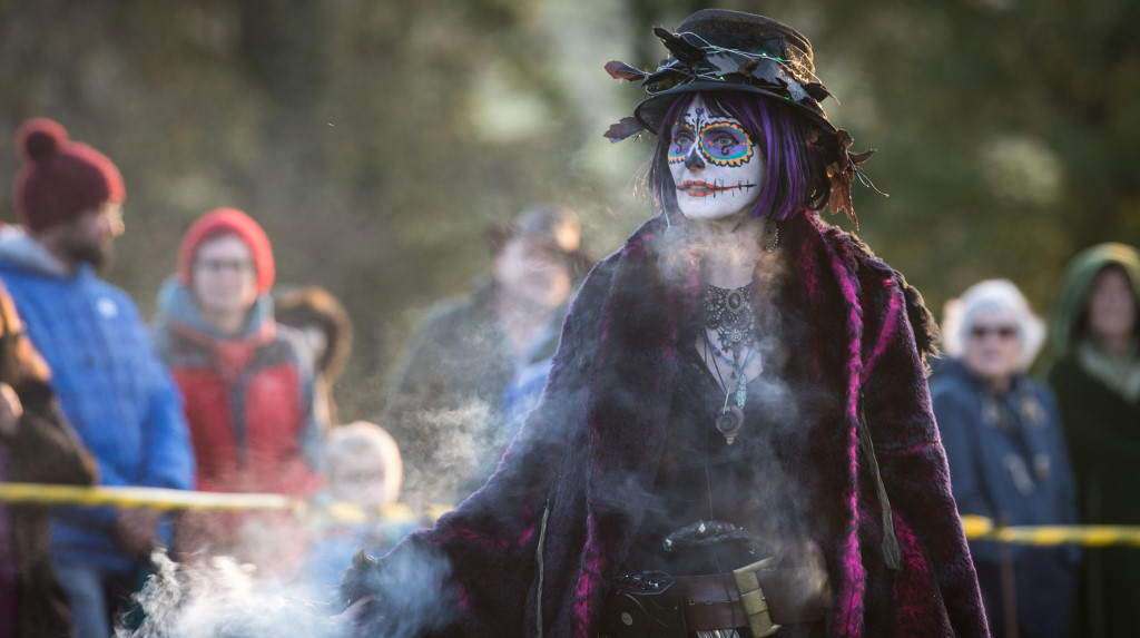 A woman with a painted face celebrating Samhain in Glastonbury