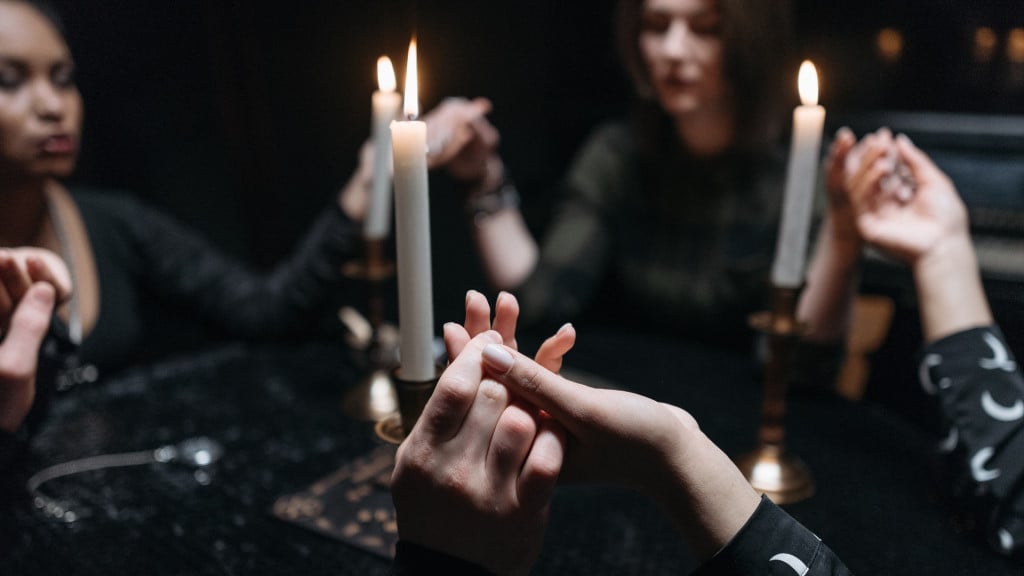 a group holding a seance