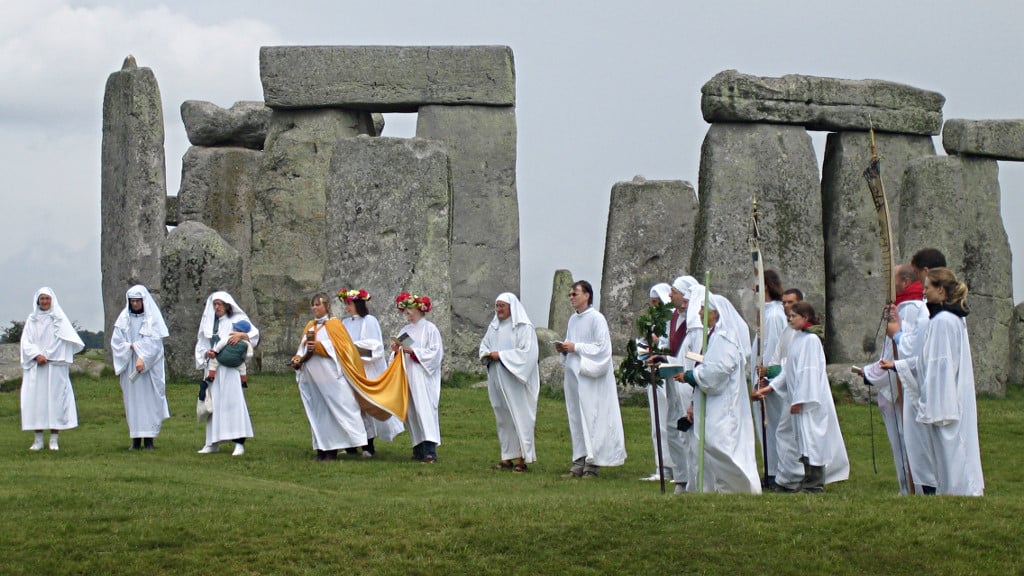 Druids performing a ritual at stonehenge