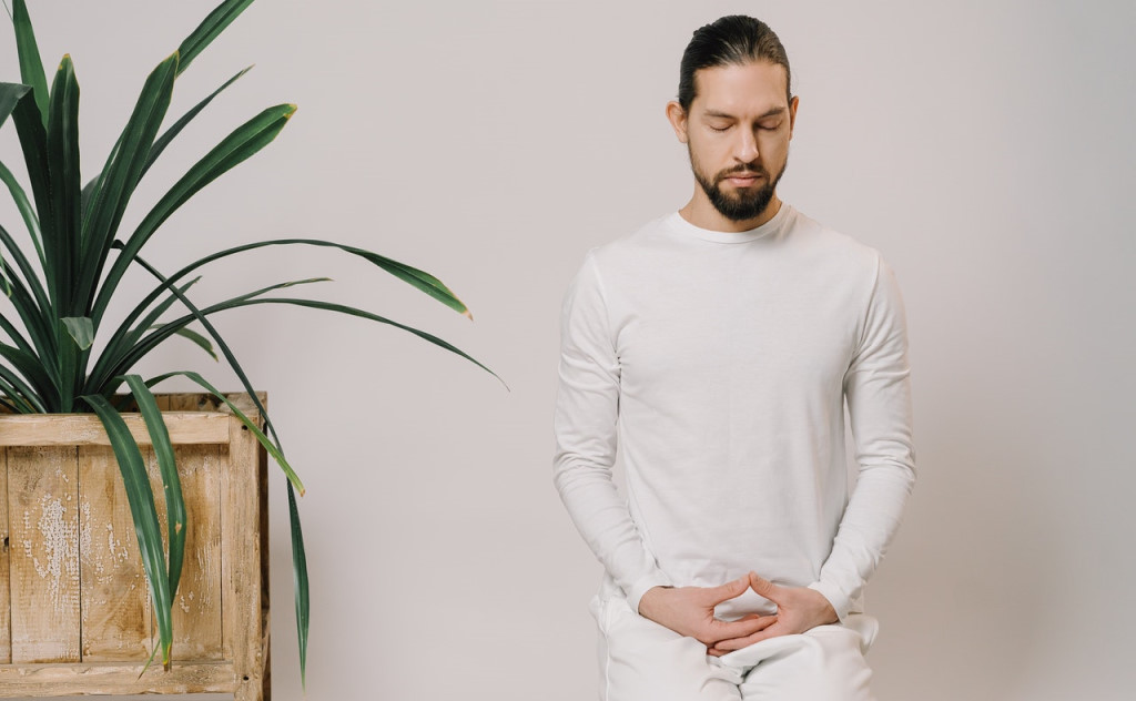 A male witch meditating