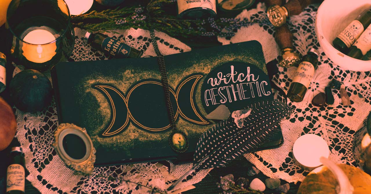 The witch aesthetic book with herbal and crystals, which are on the table