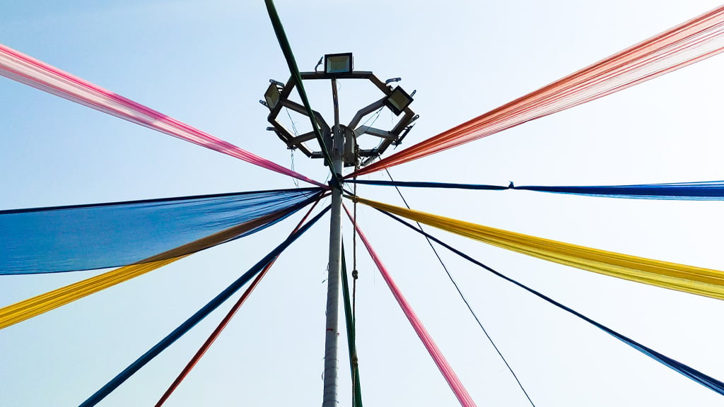 Traditional maypole with colorful ribbons