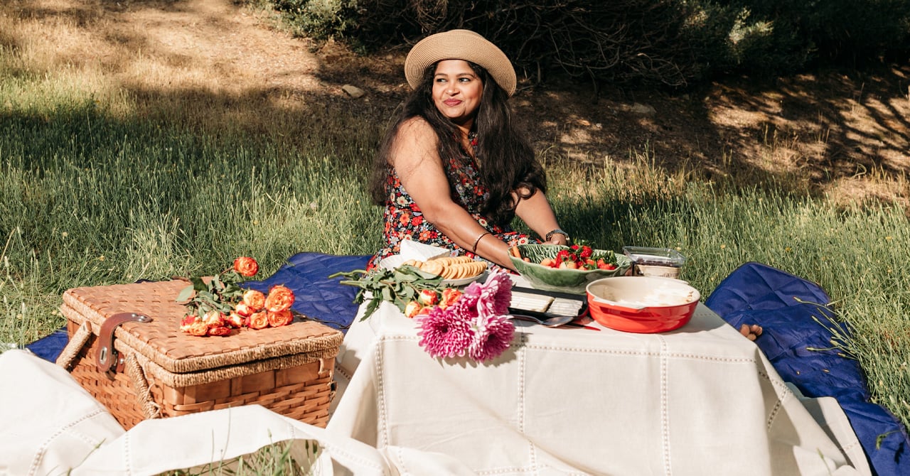 Woman having a picnic outdoors
