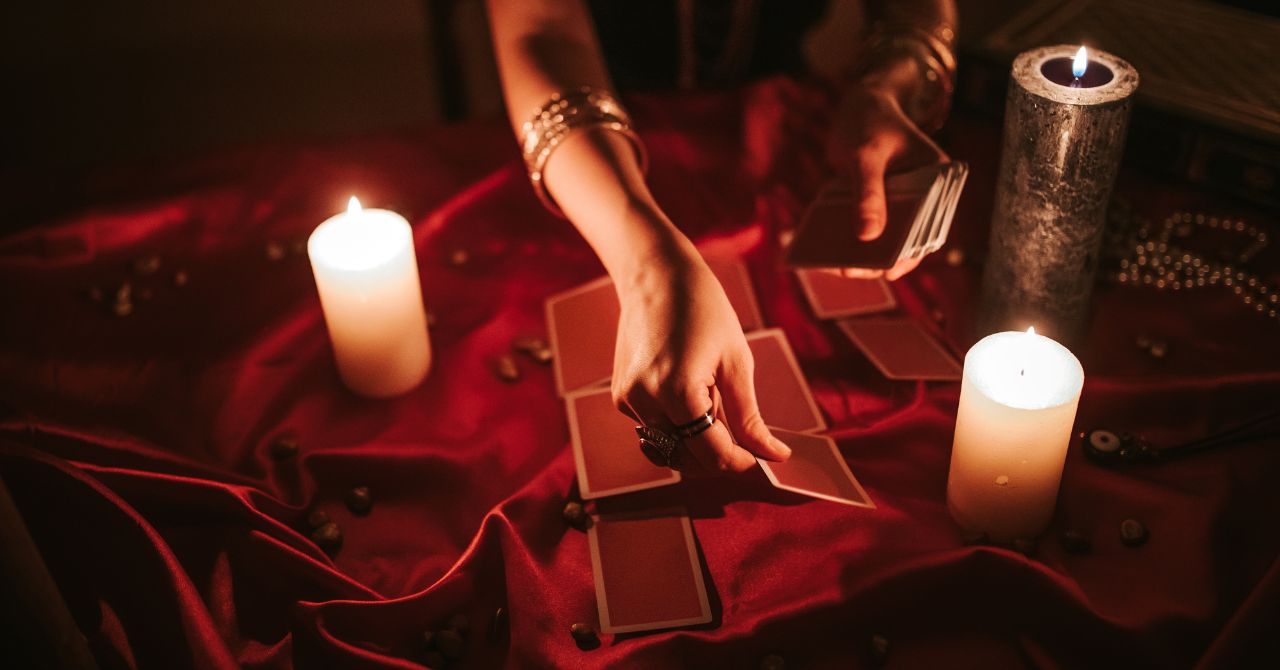 Hand holding tarot cards